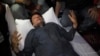 Mantan Perdana Menteri Pakistan Imran Khan, terluka dalam insiden penembakan di Wazirabad, Pakistan, Kamis, 3 November 2022. (Pakistan Tehreek-e-Insaf via AP)