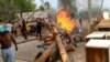 Students at the University of Malawi burn firewood to protest closure of the university on Nov. 2, 2022, in Blantyre, Malawi, and the reduction of the academic year to one semester. (Photo courtesy of University of Malawi Students Council) 