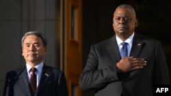 U.S. Defense Secretary Lloyd Austin welcomes South Korean Defense Minister Lee Jong-sup to the Pentagon in Washington, Nov. 3, 2022.