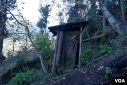 Abdul Jabbar Ganai wants to build a new house that will have an internal washroom, after one of his sons was attacked by a leopard, in Trikanjan, a hilly terrain on the Indian side of Kashmir. (Wasim Nabi for VOA)