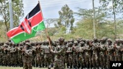 Wanajeshi wa Kenya wakihudhuria hafla iliyosimamiwa na rais wa Kenya William Ruto kabla ya kupelekwa nchini DRC kushiriki katika kikosi cha Afrika mashariki, Novemba 2, 2022.