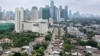 Deretan unit rumah (bawah) di pusat kota Jakarta, 1 November 2022. (BAY ISMOYO / AFP)