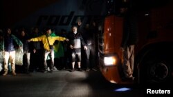 Supporters of Brazil's President Jair Bolsonaro stand at highway Castelo Branco as they protest Bolsonaro's defeat in the presidential run-off election in Barueri, Brazil, Nov. 1, 2022.