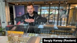 Promprylad project founder Yuriy Fylyuk next to a model of the project on May 29, 2021. Entrepreneurs in western Ukraine are turning a large manufacturing building from Soviet times into a center for education, business, and art. (REUTERS/Sergiy Karazy)