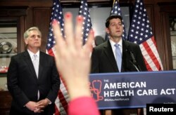 FILE - Speaker of the House Paul Ryan and House Majority Leader Kevin McCarthy answer questions about the American Health Care Act, the Republican replacement to Obamacare, at the Republican National Committee in Washington, March 8, 2017.