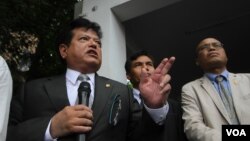 FILE: In this file photo taken on May 30, 2016, Nhem Ponharith, an opposition lawmaker and spokesperson of Cambodia National Rescue Party, speaks to the press at the party's headquarter, in Phnom Penh. 