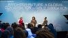 First lady Michelle Obama, flanked by actress Yara Shahidi (R) and Glamour Magazine Editor in Chief Cindi Leive, participates in Glamour's “A Brighter Future: A Global Conversation on Girls' Education,” in celebration of International Day of the Girl and Let Girls Learn, Oct. 11, 2016, at the Newseum in Washington.