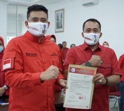 Bakal calon Wali Kota Medan, Bobby Afif Nasution dan wakilnya Aulia Rahman yang diusung PDIP dalam kontestasi Pilkada Medan 2020, Selasa, 11 Agustus 2020. (Foto: Courtesy/DPD PDIP Sumut)