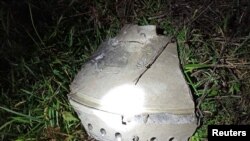 Debris that locals claimed to be part of a missile is pictured at the site of an explosion in Przewodow, a village in eastern Poland near the border with Ukraine, Nov. 16, 2022.