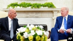 President Joe Biden meets with Afghan President Ashraf Ghani in the Oval Office of the White House in Washington, June 25, 2021.
