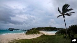Wind and surf picks up as Hurricane Nicole approaches the Cooper’s Island Nature Reserve in St. Georges, Bermuda, Oct. 12, 2016.