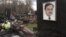 caption: A tombstone on the grave of lawyer Sergei Magnitsky, who died in jail, at a cemetery in Moscow, November 16, 2012.