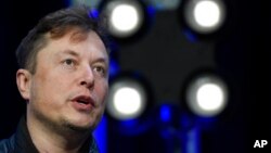 FILE - Elon Musk speaks at the SATELLITE Conference and Exhibition on March 9, 2020, in Washington.