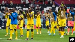 Ecuador players celebrate at the end of the World Cup group A soccer match between Qatar and Ecuador at the Al Bayt Stadium in Al Khor, Qatar, Nov. 20, 2022.