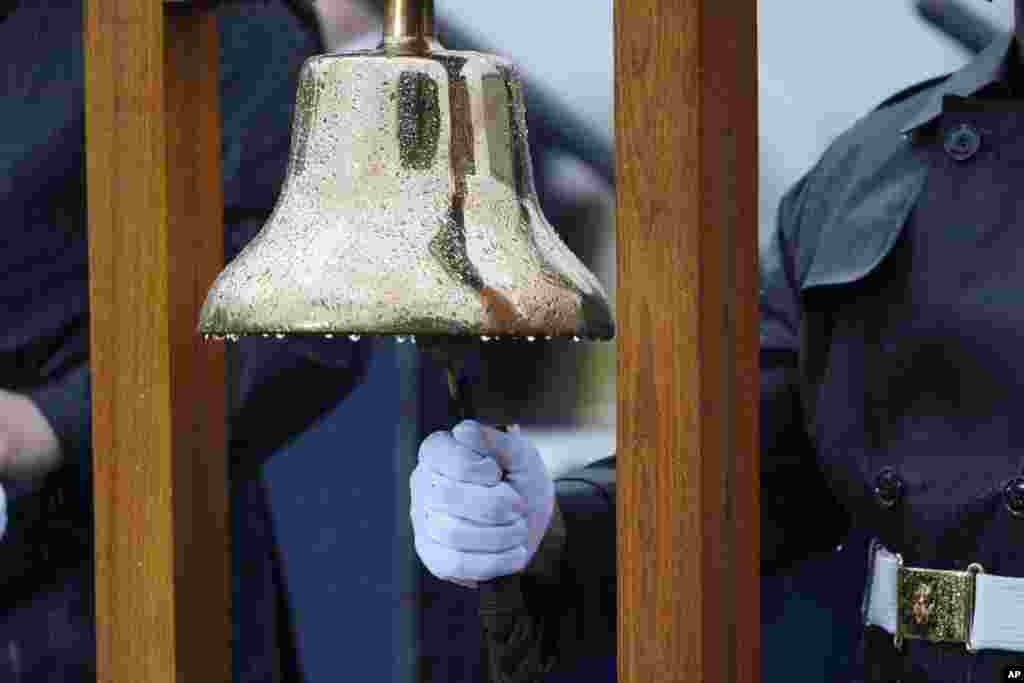 A bell is rung during a ceremony at the Pentagon in Washington, Sept. 11, 2022, to honor and remember the victims of the 9/11 terror attack.