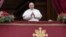 Pope Francis looks at the crowd before delivering the Urbi et Orbi (Latin for 'to the city and to the world' ) Christmas' day blessing from the main balcony of St. Peter's Basilica at the Vatican, Dec. 25, 2021.