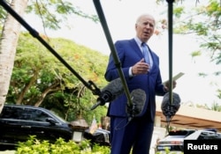 美国总统拜登2022年11月16日在印尼巴厘岛见媒体评论波兰遭导弹袭击事件。（路透社）