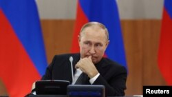 FILE - Russian President Vladimir Putin chairs a meeting of the State Council Presidium on tourism development, in Vladivostok, Russia, Sept. 6, 2022. (Valeriy Sharifulin/TASS Host Photo Agency/Handout via Reuters)