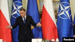 Polish President Andrzej Duda speaks during a meeting of the country's security committee in Warsaw on November 16, 2022, following an explosion on the territory of Poland the previous day. Slawomir Kaminski/Agencja Wyborcza via Reuters)