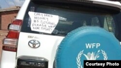 The World Food Program vehicle protesters seized Wednesday, Nov. 2, at Dzaleka refugee camp in Malawi. Refugees are protesting food rations and say they will release the vehicle when their demands are met. (Photo courtesy of protesters.)
