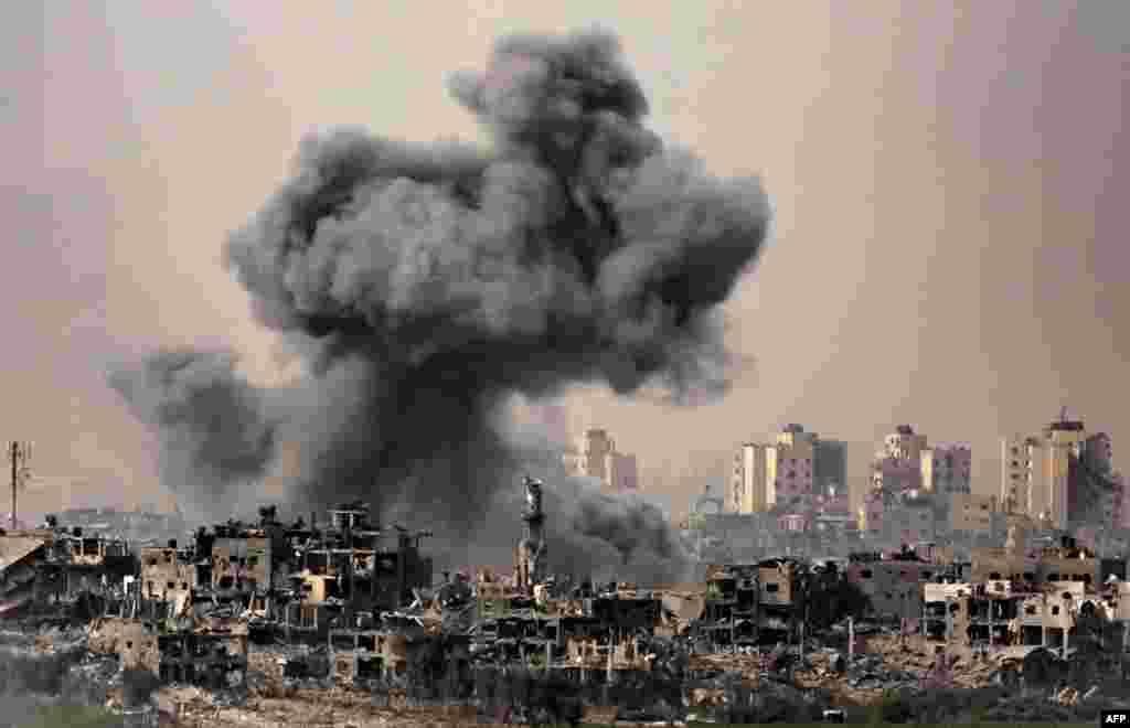 This image taken from the Israeli border with the Gaza Strip on Oct. 29, 2023, shows a black cloud of smoke ascending from the Gaza Strip amid the ongoing battles between Israel and the Palestinian group Hamas. 
