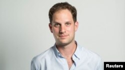 Evan Gershkovich, a reporter for The Wall Street Journal, appears in an undated handout image taken in an unidentified location. (The Wall Street Journal/Handout via Reuters)