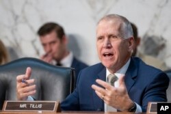 Republican Sen. Thom Tillis speaks on Capitol Hill in Washington, Dec. 6, 2023.