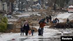 27일 가자지구 북부에서 남쪽으로 이동하는 주민들.
