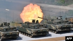 South Korea's K-2 tanks fire during a South Korea-US joint military drill at Seungjin Fire Training Field in Pocheon on June 15, 2023.