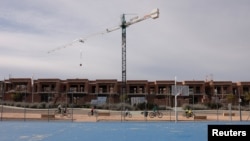 FILE - A row of houses are under construction in Ronda, Spain, Feb. 5, 2024. The Spanish government said on April 8, 2024, it will scrap "golden visas" that allow people from outside the EU to obtain residency permits by investing in real estate. 