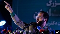 FILE - Iranian lawyer Mohsen Borhani speaks during a campaign rally of the reformist candidate for the presidential election Masoud Pezeshkian, in Tehran, Iran, July 3, 2024.