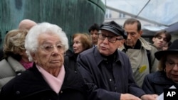 French Nazi hunter Serge Klarsfeld and Auschwitz survivor Esther Senot attend a gathering in the Paris Holocaust memorial to sound the alarm about resurgent antisemitism linked to the Israel-Hamas war, in Paris, Nov. 18, 2023.