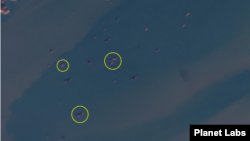 북한 서해 석도 인근 해상에서 선박 간 환적 정황(원 안)이 포착됐다. 사진=Planet Labs