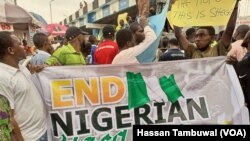 Masu zanga-zangar tsadar rayuwa a Ibadan, babban birnin jihar Oyo.