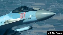 A Russian fighter flies dangerously close to a US MQ-9 drone before deploying flares directly over the drone that was on a mission in Syria July 23, 2023. (US Air Force photo)