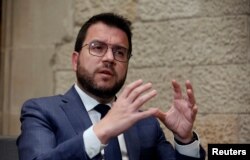 FILE - Catalonia's regional head of government Pere Aragones speaks in Barcelona, Spain, April 20, 2022.