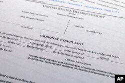 FILE - The criminal complaint against Jack Teixeira, April 14, 2023