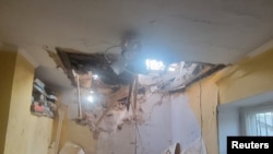 Zgrada oštećena tokom napada ruskih raketa i dronova, u Odesi, 18. jula 2023. (Pres služba Operativne komande Jug ukrajinskih oružanih snaga/Handout preko Reutersa)