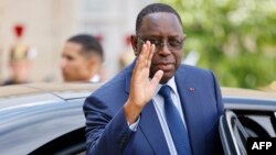 L'ancien président sénégalais Macky Sall quitte le palais de l'Élysée à Paris, le 23 juin 2023. AFP / Ludovic Marin
