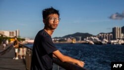 FILE - This picture taken on Aug. 8, 2020, shows Tony Chung posing in Hong Kong. 