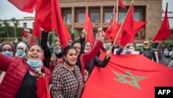 En décembre 2020, des Marocains célèbrent à Rabat la décision américaine d'inclure le Sahara occidental dans la carte officielle du Maroc.