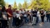 FILE - A crowd gathers outside a Turkish court after it decided to release 14 Kurdish journalists on bail in Diyarbakir, Turkey, on July 12, 2023. (Photo: Mahmut Bozarslan/VOA Turkish).