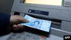 Le pays connaît depuis deux ans une inflation élevée très pénalisante pour les couches populaires, due notamment à une forte dépendance du pays aux importations en céréales et énergie qui ont flambé après l'invasion de l'Ukraine par la Russie. (Photo by FETHI BELAID / AFP)