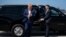 FILE - Former President Donald Trump arrives to board his airplane for a trip to a campaign rally in Waco, Texas, at West Palm Beach International Airport, March 25, 2023, in West Palm Beach, Fla.