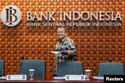 FILE: Gubernur Bank Indonesia Perry Warjiyo pada jumpa pers di kantor pusat Bank Indonesia di Jakarta, 19 Januari 2023. (REUTERS/Ajeng Dinar Ulfiana)