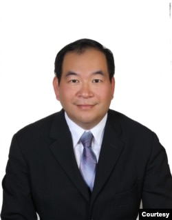 海峡两岸经贸文化交流协会秘书长邓岱贤