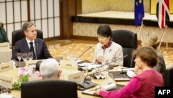US Secretary of State Antony Blinken (L) and Japanese Foreign Minister Yoko Kamikawa (2nd L) attend a working dinner as part of their G7 foreign ministers' meetings in Tokyo on Nov. 7, 2023.
