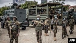 Soldiers of the Kenya Defense Forces are deployed at a stadium ahead of a planned demonstration called after a nationwide deadly protest against a now-withdrawn tax bill left over 20 dead in downtown Nairobi, on June 27, 2024.