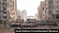 រថក្រោះ​យោធា​របស់​អ៊ីស្រាអែល​កំពុង​ស្ថិត​នៅ​ក្នុង​តំបន់​កាហ្សា​ដើម្បី​ប្រយុទ្ធ​នឹង​ក្រុម​ហាម៉ាស់ ថ្ងៃទី ១២ ខែវិច្ឆិកា ឆ្នាំ២០២៣។