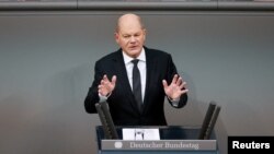 German Chancellor Olaf Scholz speaks at the 2024 budget debate of the German lower house of parliament, the Bundestag, in Berlin, Germany, Jan. 31, 2024. 
